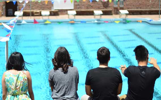 Students in front of swimming pool